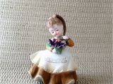 Lefton Birthday Girl Figurines Vintage Lefton February Geo Birthday Girl Flower Purple