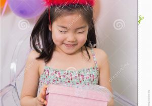 Little Birthday Gifts for Her Little Girl with Gift Box at Her Birthday Party Stock